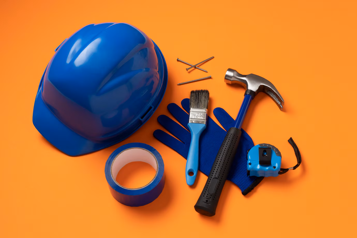 top-view-steel-hammer-with-other-construction-elements-tools_23-2150576468
